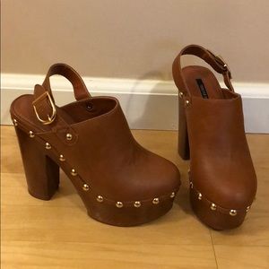 Never worn closed toe platform